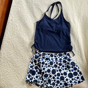 Modli extra large tankini top with skirted shorts for the bottom.
